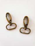 25 mm (1") oval svingklemme, oval stroppkobling