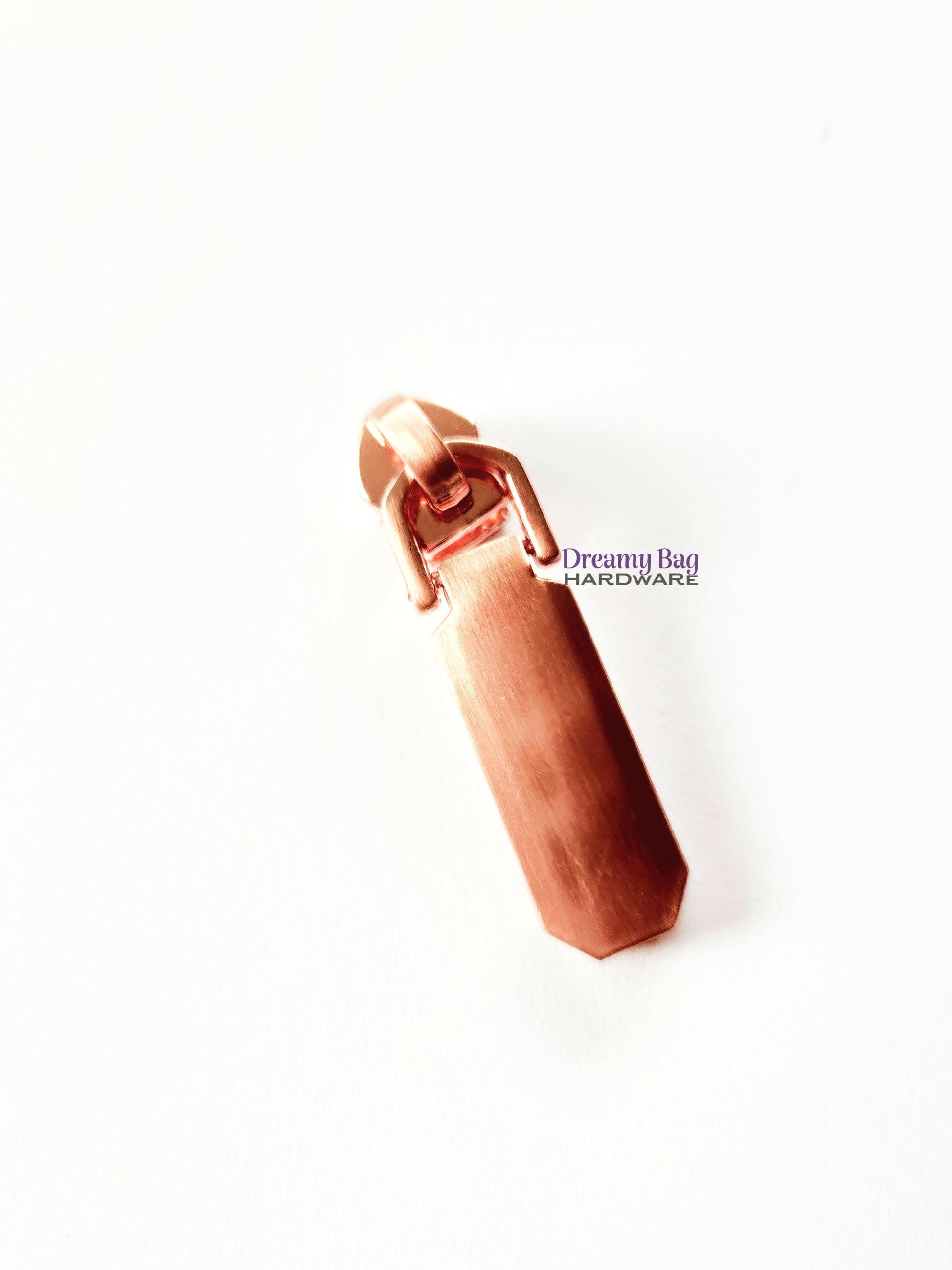 Børstet roségullbeslag