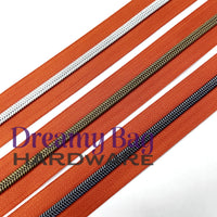 #5 Zipper Tape Tangerine with coloured nylon teeth