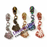 #5 Glidelåstrekker påfugl