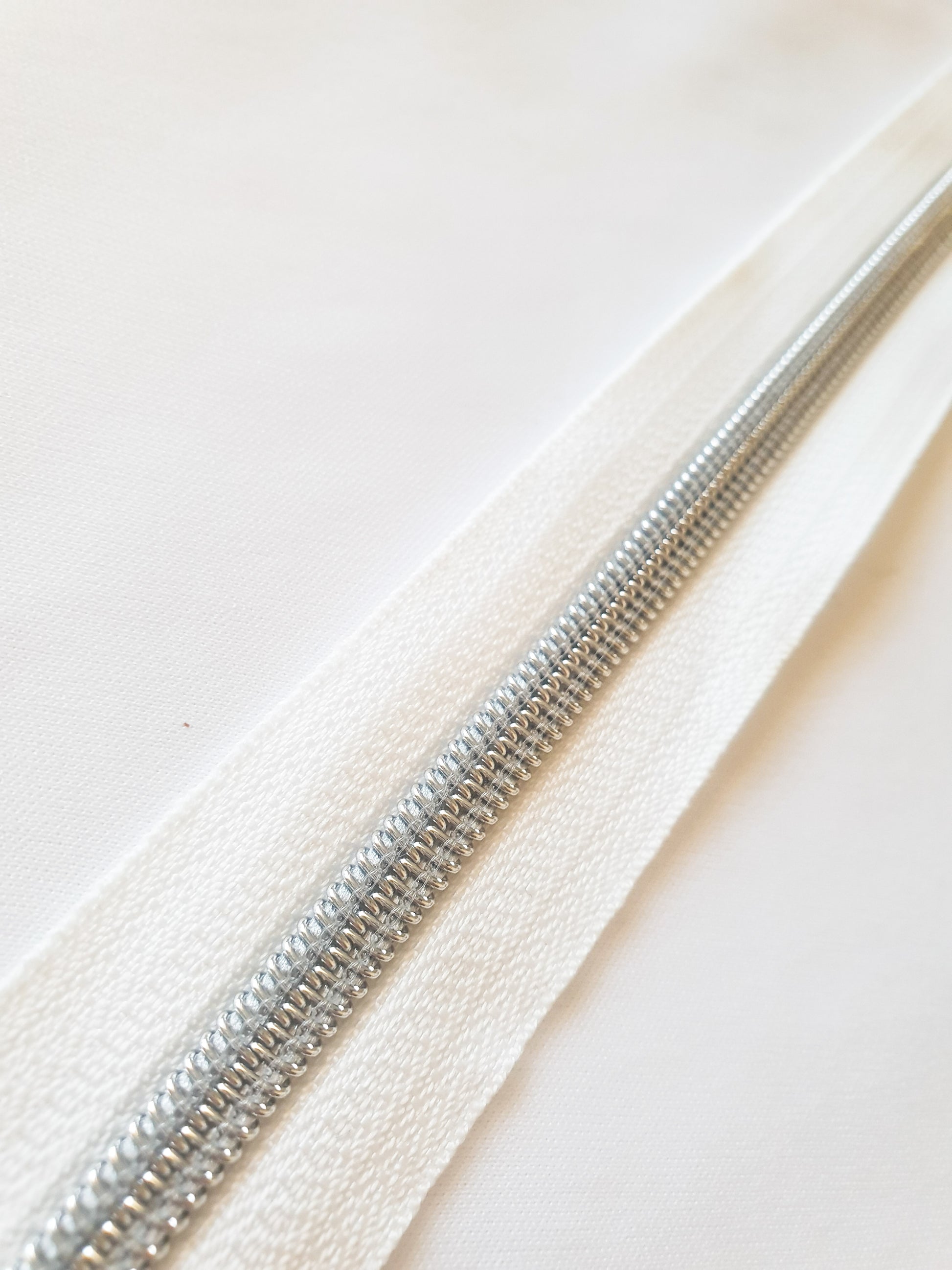 #3 and #5 Zipper Tape White with coloured nylon teeth